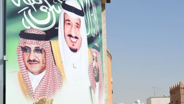 A banner Saudi King Salman bin Abdulaziz, Crown Prince and Interior Minister Mohammed Bin Nayef in Riyadh (AFP)