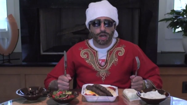 Towel on head? Check. Strong Accent? Check. All Arab stereotypes covered? Check.