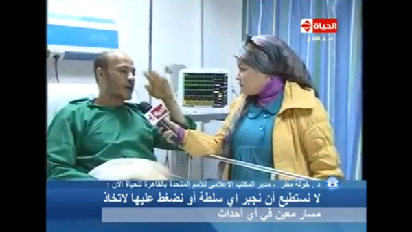 Hamda says it was those pesky protestors that stripped him bare, not the sweet policeman.