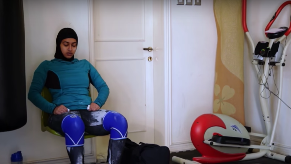 Amna al Hadad during a break in training (Youtube)
