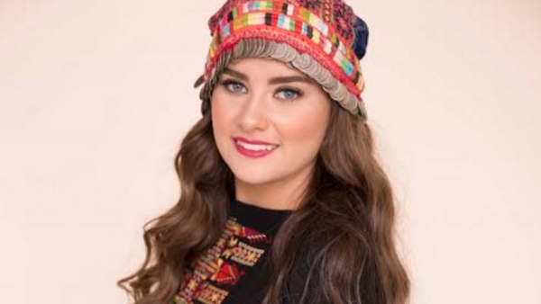 Natalie Rantissi in her traditional Palestinian costume. (Hajjajcartoons.com)