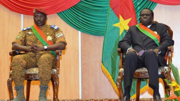 Amnesty International released a report Monday saying Burkina Faso has high rates of child marriage. Pictured are former acting president of Burkina Faso Michel Kafando (right) and former acting prime minister Isaac Zida (left). [photo: AFP]