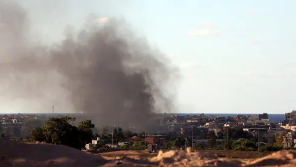 Smoke from rocket fire rises in Sirte, Libya. (AFP/File)