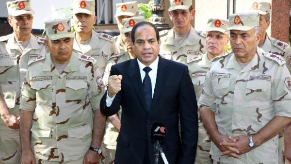 Egypt's President Abdel Fattah al-Sisi surrounded by top military generals after an emergency meeting of the Supreme Council of the armed Forces in Cairo. (AFP/ File Photo)