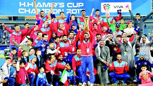 The Amir Cup champions Al-Kuwait Football Club celebrate with officials and fans. (Photo: Arab Times)