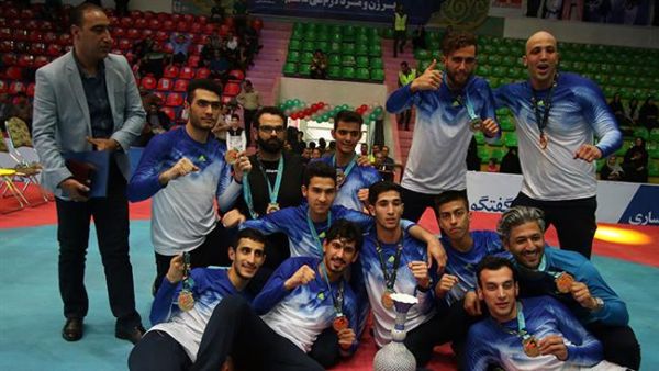 Members of the Iranian men’s Shahrdari Varamin taekwondo club rejoice after claiming the title of the 7th edition of the Asian taekwondo Clubs Championship in Sari, northern Iran, on April 14, 2017. (Photo: Press TV)