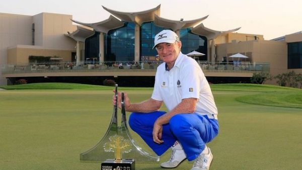Chris Williams poses with the Sharjah Senior Masters trophy. (Photo: Sharjah Senior Masters)