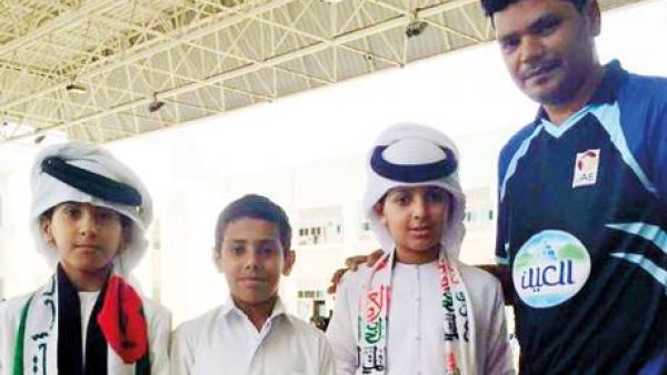 Coach Shahzada Saleem with young Emiratis who are being groomed to play cricket in Al Ain. (Photo: ECB)