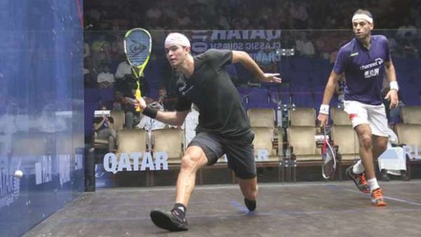 Diego Elias of Peru (front) in action against top seed Mohamed Elshorbagy of Egypt in the quarter-finals of the Qatar Classic yesterday. The Peruvian advanced to the last 4 with an upset victory. (Photo: Gulf Times)