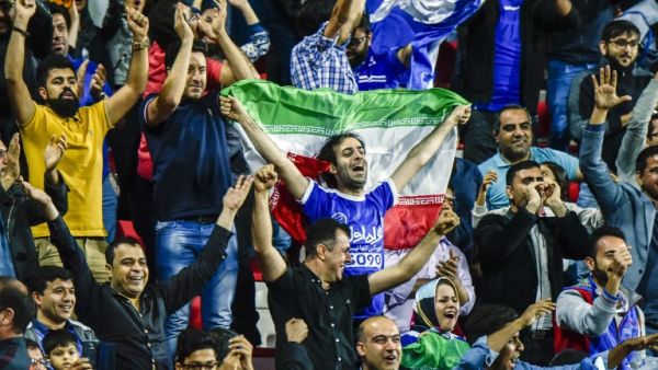 Esteghlal FC supporters attend the AFC Champions League qualifying football match between UAE's Al-Ahli and Iran's Esteghlal FC at Al-Rashid Stadium in Dubai on February 20, 2017.
STRINGER / AFP