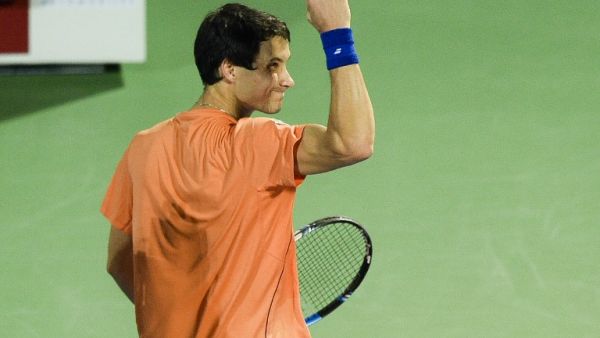 Evgeny Donskoy of Russia celebrates after winning his match against Switzerland's Roger Federer, as part of the ATP tennis match as part of the Dubai Duty Free Championships, on March 1, 2017, in Dubai.
STRINGER / AFP