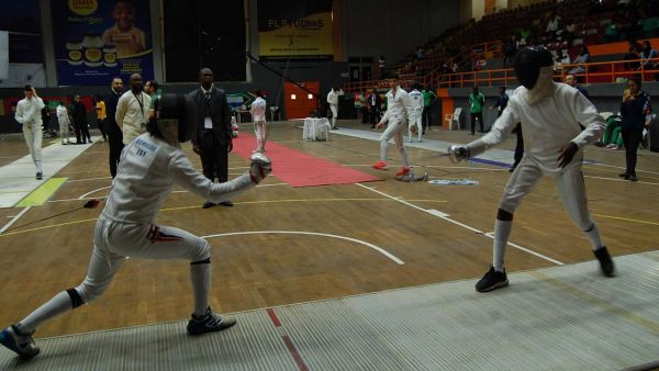 Ramadan Ibrahim of Egypt (left) takes on Nigeria’s Olagunju Zaafir in one of the duels of the Cadet and Junior African Fencing Championship. (PHOTO: NAJEEM RAHEEM)