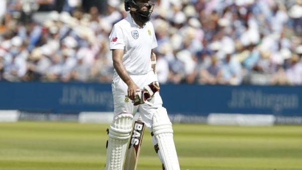 South Africa's Hashim Amla walks back to the pavilion after losing his wicket on the second day of the first Test match between England and South Africa at Lord's Cricket Ground in central London on July 7, 2017.
Ian KINGTON / AFP