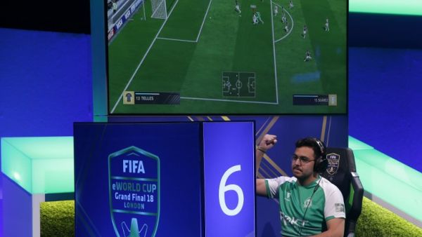 Player Mossad Aldossary competes in the group stages of the FIFA eWorld Cup Grand Final, at the O2 in London on August 2, 2018. The FIFA eWorld Cup Grand Final 2018 will see 32 finalists battle it out for the main prize – the title of FIFA eWorld Cup champion, and pocket USD 250,000 in prize money.
Daniel LEAL-OLIVAS / AFP