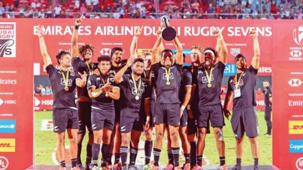 New Zealand team celebrate after clinching the Dubai Rugby Sevens title at The Sevens Stadium in Dubai. (Photo: Antonin Kélian Kallouche/Gulf News)