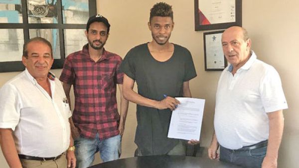 Oman national team midfielder Raed Ibrahim (second from right), his agent Issam al Shanfari (second from left), and Valletta FC officials after the signing of a two-year deal between Raed and Valletta in Malta 