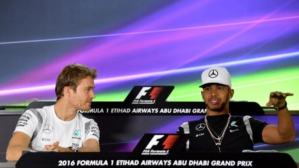 Nico Rosberg (L) takes a 12-point lead over Mercedes team-mate Lewis Hamilton (R) into the season-ending Abu Dhabi Grand Prix which puts him in the driver's seat to clinch his first career Formula One world title.