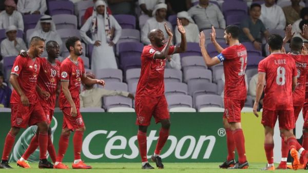 Al-Duhail's players celebrate during the AFC Champions League match Al-Ain (UAE) vs Al-Duhail (Qatar) at Hazza Bin Zayed Stadium, on May 8, 2018 in the United Arab Emirate of al-Ain.
KARIM SAHIB / AFP