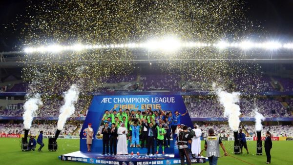 Jeonbuk players celebrate as they are crowned champions following their AFC Champions League final between UAE's Al-Ain and South Korea's Jeonbuk Hyundai Motors at the Hazza bin Zayed Stadium in Al-Ain on November 26, 2016.
NEZAR BALOUT / AFP
