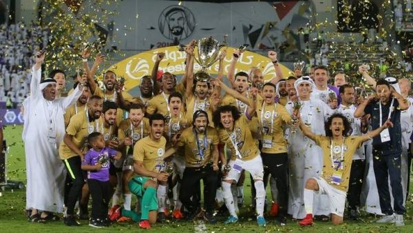 Al Ain players celebrate after winning the President's Cup final against Al Wasl at Zayed Sports City Stadium in Abu Dhabi on Thursday night. (Photo: Ryan Lim)

