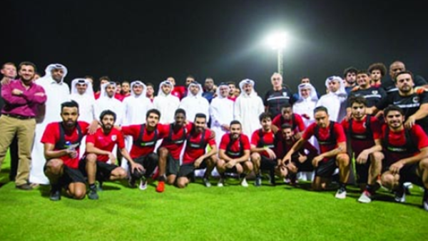 Al Rayyan football players, coaches and club members pose with Supreme Committee for Delivery & Legacy officials at the launch of the new training facilities at Al Rayyan Sports Club (Photo: Gulf Times)