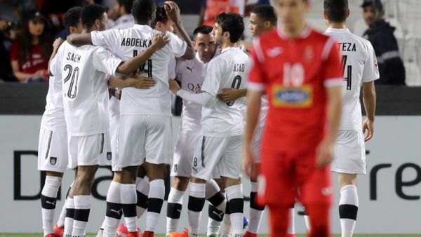 Al-Sadd's players celebrate during the AFC Champions League match al-Sadd vs Persepolis at the Jassim Bin Hamad Stadium in Doha on February 20, 2018.
KARIM JAAFAR / AFP