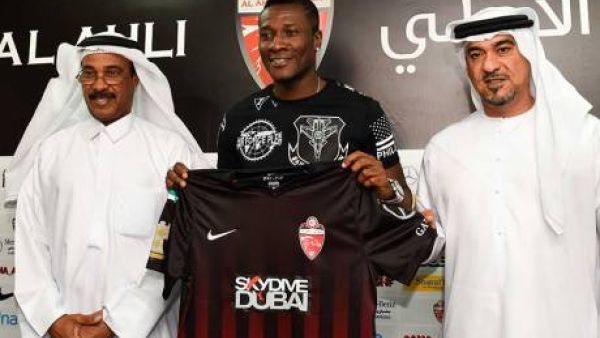 Asamoah Gyan, new signing of Al Ahli club with CEO Obaid Saeed and team manager Abdul Majid Hussain at a media conference in Dubai (Photo: Gulf News)