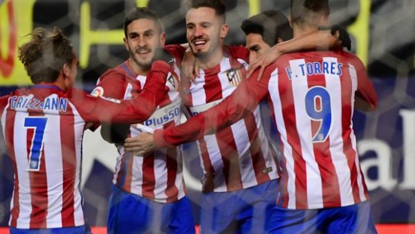 لاعبو أتلتيكو يحتفلون بالهدف