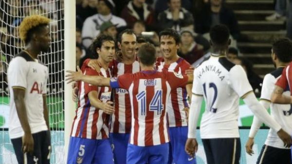 لاعبو أتلتيكو يحتفلون بهدف غودين