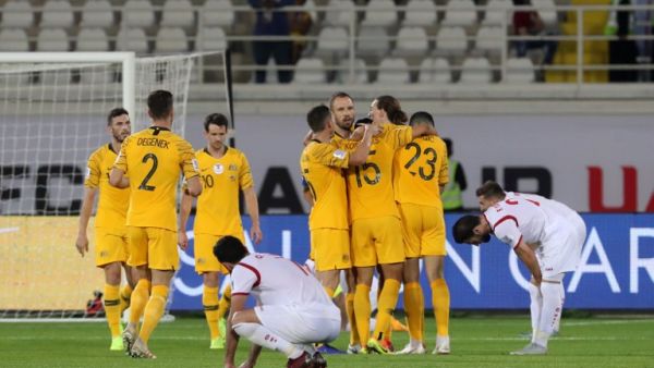 Australia celebrate their 3-2 win in the 2019 AFC Asian Cup group B football match between Australia and Syria at the Khalifa bin Zayed stadium in al-Ain on January 15, 2019.
Karim Sahib / AFP