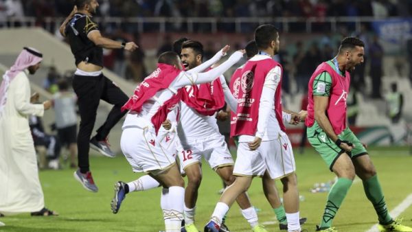 Bahrain's players celebrate after winning the 2019 AFC Asian Cup group A football match between India and Bahrain at the Sharjah Stadium in Sharjah on January 14, 2019.
Karim Sahib / AFP