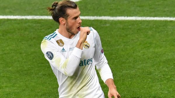 Real Madrid's Welsh forward Gareth Bale celebrates after scoring the the 3-1 during the UEFA Champions League final football match between Liverpool and Real Madrid at the Olympic Stadium in Kiev, Ukraine on May 26, 2018.
Sergei SUPINSKY / AFP