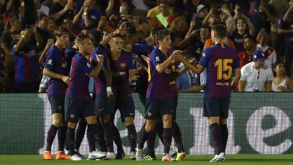 لاعبو برشلونة خلال المباراة مع توتنهام ضمن الكأس الدولية للأبطال