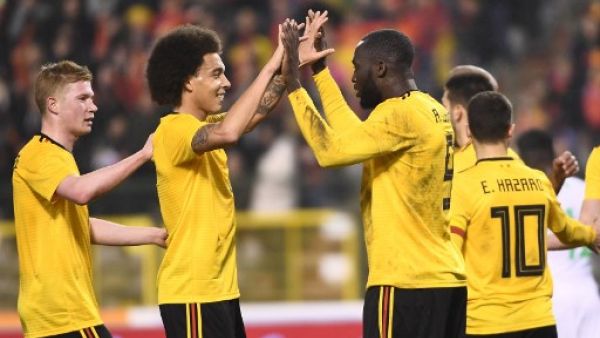 Belgium's forward Romelu Lukaku (3rdR) celebrates with Belgium's midfielder Axel Witsel (2ndL) and Belgium's midfielder Kevin De Bruyne (L) after scoring his second goal during a friendly international match between Belgium and Saudi Arabia at the King Baudouin stadium in Brussels on March 27, 2018.
Emmanuel DUNAND / AFP