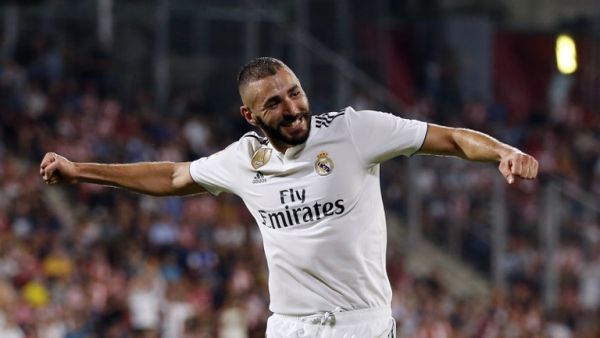 Real Madrid's French forward Karim Benzema celebrates his second goal during the Spanish league football match between Girona FC and Real Madrid CF at the Montilivi stadium in Girona on August 26, 2018.
Pau BARRENA CAPILLA / AFP