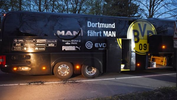 Borussia Dortmund's damaged bus is pictured after an explosion some 10km away from the stadium prior to the UEFA Champions League 1st leg quarter-final football match BVB Borussia Dortmund v Monaco in Dortmund, western Germany on April 11, 2017.
Patrik STOLLARZ / AFP Borussia Dortmund's damaged bus is pictured after an explosion some 10km away from the stadium prior to the UEFA Champions League 1st leg quarter-final football match BVB Borussia Dortmund v Monaco in Dortmund, western Germany on April 11, 2017.
Patrik STOLLARZ / AFP