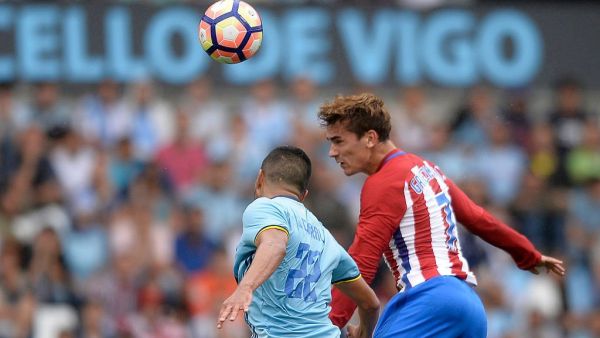 غريزمان (يمين) يقود أتلتيكو لفوزه الأول هذا الموسم