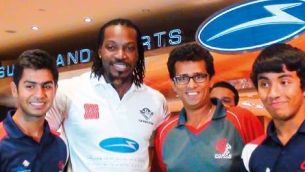 West Indies legendary batsman Chris Gayle with coach Gopal Jasapara (third from left) and G Force Academy’s players Shorye Chopra and Kartik Shekar. (Photo: Gulf News)