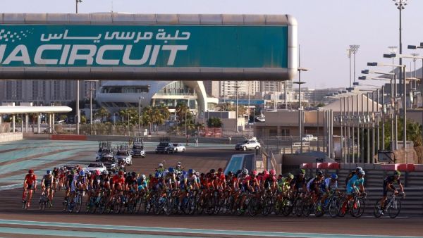 Cyclists ride their bikes during the Abu Dhabi tour from the Yas Marina Circuit to Yas Mall where the tour finishes in the Emirati capital Abu Dhabi, on October 11, 2015. AFP PHOTO / STR
STR / AFP