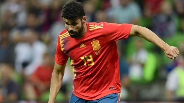  Spain have moved level on points with Portugal at the summit of Group B after edging past a spirited Iran side at the Kazan Arena. 