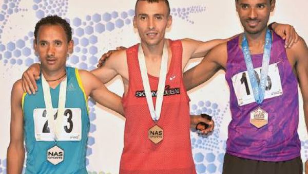 It was honours even for runners from Morocco andEthiopia at the 10km road race held as part of the FourthNad Al Sheba (NAS) Ramadan Sports Tournament (Photo: DSC)