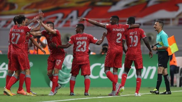 Al-Duhail SC's players celebrate their victory against Persepolis FC during their AFC Champions League football match at Khalifa International Stadium in Doha on August 28, 2018.
Karim JAAFAR / AFP