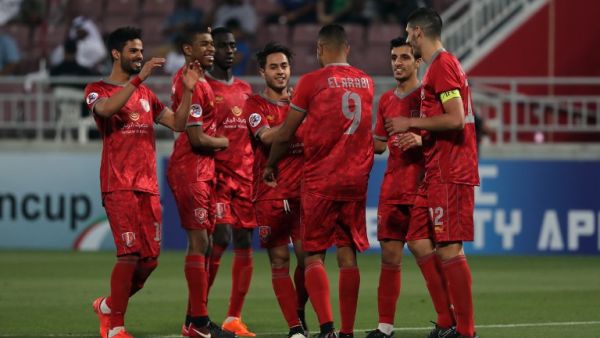 Duhail's players celebrate scoring during their AFC Champions League match between Qatar's Al-Duhail and Emirates' Al-Wahda at the Abdullah bin Khalifa Stadium in Doha on April 17, 2018.
KARIM JAAFAR / AFP
