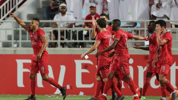 Al-Duhail's players celebrate a goal during the AFC Champions League football match Al-Ain vs Al-Duhail at the Abudullah bin Khalifa Stadium in Doha on May 15, 2018.
KARIM JAAFAR / AFP