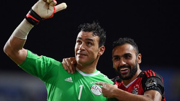 Egypt's goalkeeper Essam El-Hadary (L) and Egypt's midfielder Ahmed Elmohamady celebrate at the end of the penalty shootout of the 2017 Africa Cup of Nations semi-final football match between Burkina Faso and Egypt at the Stade de l'Amitie Sino-Gabonaise in Libreville on Feb 1, 2017.
GABRIEL BOUYS / AFP