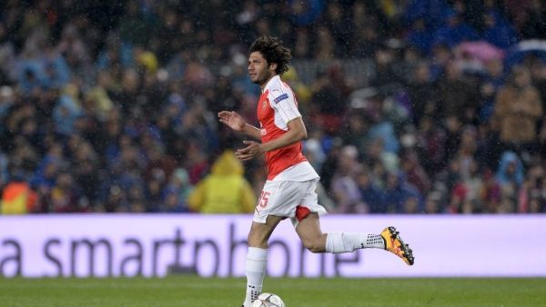Arsenal's Egyptian midfielder Mohamed Elneny celebrates his goal during the UEFA Champions League Round of 16 second leg football match FC Barcelona vs Arsenal FC at the Camp Nou stadium in Barcelona on March 16, 2016.
JOSEP LAGO / AFP