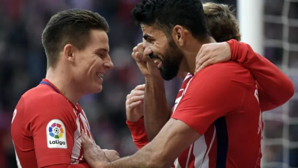 كوشتا (يمين) وغاميرو يقودان أتلتيكو مدريد للفوز