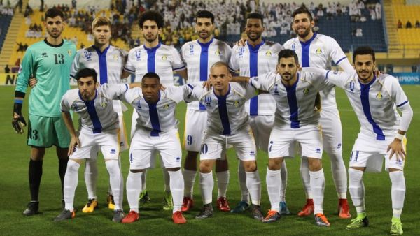 Al-Gharafa's first eleven pose for a team photo prior to the start of the AFC Champions League Group A football match between Qatar's Al-Gharafa and Tractor Sazi Tabriz of Iran at the Thani Bin Jassim Stadium in Doha, on February 19, 2018.
KARIM JAAFAR / AFP