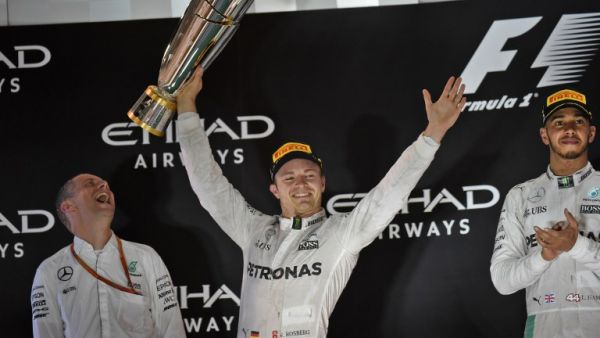 Mercedes AMG Petronas F1 Team's German driver Nico Rosberg celebrates at the end of the Abu Dhabi Formula One Grand Prix at the Yas Marina circuit on November 27, 2016.
MOHAMMED AL-SHAIKH / AFP