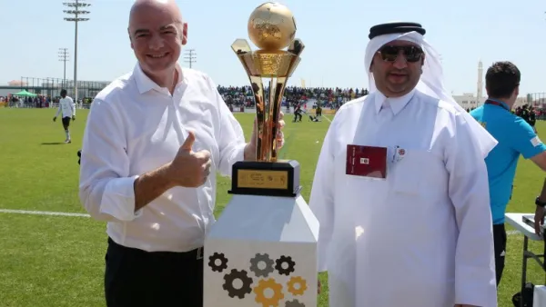 Infantino (L) during a previous visit to Doha